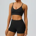 Two-piece black yoga set for women featuring a V-neck sports bra and tight gym shorts - S / Top And Bottom / Black