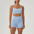 Two-piece light blue yoga set featuring a sports bra and high-waisted fitness shorts - S / Top And Bottom / Air Blue