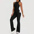 Ärmelloser schwarzer Yoga-Jumpsuit mit rückenfreiem Design, Seitentasche und Schlaghose - Schwarz
