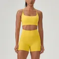 Professional bright yellow two-piece yoga set featuring sports bra and high-waist shorts - S / Top And Bottom / Marigold Yellow