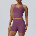 Purple athletic yoga set featuring halter neck top and high-waisted lifting shorts - S / Top And Bottom / Amaranth Purple