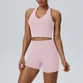 High-waisted pink yoga set with halter sports bra and compression fitness shorts - S / Top And Bottom / Cornus Pink