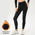 High-waisted black fleece-lined leggings for yoga and running with thermal warmth detail - S / Bottoms / Black With Grey Line