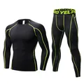 Black men's compression sports suit set featuring vibrant lime green stitching details - Black/Green Stitch