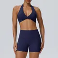 Dark blue two-piece halter yoga set with cross-front sports bra and high-waist gym shorts. - S / Top And Bottom / Navy Blue