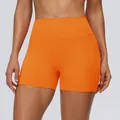 Felgele oranje yoga shorts met hoge taille voor dames, sneldrogend met push-up effect. - Levendig Oranje