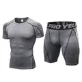 Grijze compressie sportset voor heren met t-shirt met korte mouwen en strakke sportshort. - Gris Melange