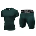 Donkergroene compressie-sportset voor heren inclusief top met korte mouwen en sportshort - Donker Inktgroen