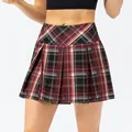 Red plaid pleated athletic tennis skort for women, ideal for yoga, running and dance - Volcanic Red Plaid