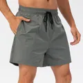 Dark grey men's loose quick-dry sports shorts with breathable lining and drawstring - S / Bottoms / Gray