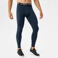 Donkerblauwe heren compressiebroek met fleecevoering voor wintersport en fitness - S / Bottoms / Marineblauw