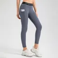 Grey high-waisted yoga pants with side pocket made of breathable athletic fabric - Medium Grey