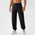Men's black quick-dry breathable textured sports joggers with elastic waist and cuffed ankles - S / Bottoms / Black