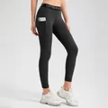 High-waisted black yoga leggings with side pocket for phone and upgrade lettering - S / Bottoms / Black