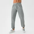 Men's grey quick-dry textured joggers with elastic waist and cuffed ankles for fitness. - S / Bottoms / Cloud Grey