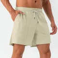 Breathable quick-dry men's loose sports shorts in khaki color for fitness and running - Ivory