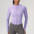 Slim fit lavender yoga jacket with a mock neck, long sleeves, zipper, and thumbholes - S / Tops / Taro Purple