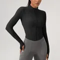 Black women's slim-fit long-sleeve yoga jacket featuring a zipper and stand collar - S / Tops / Black