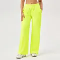 Dames sportbroek met wijde pijpen in neongeel, gestructureerde stof en elastische taille - Geel