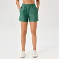 Women's high waist quick-dry sports shorts with green honeycomb pattern - S / Bottoms / Green