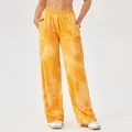 Getextureerde sportbroek voor dames met wijde pijpen in levendige oranje en gele print - Oranje Wit Tie-dye