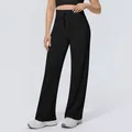Detail view of black high-waisted wide-leg yoga pants with adjustable drawstring waist - S / Bottoms / Black
