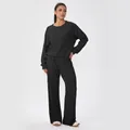 Women's black waffle knit two-piece lounge set with long sleeve top and wide leg pants - S / Top And Bottom / Black