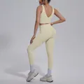 Back view of women's cream V-neck sports bra and high-waisted leggings yoga set. - S / Top And Bottom / Khaki