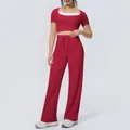 Red two-piece yoga set featuring a short sleeve crop top and wide-leg drawstring pants - S / Top And Bottom / Rouge Red