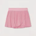 Detail of a pink quick-dry pleated tennis skirt for women with built-in shorts. - S / Bottoms / Pink