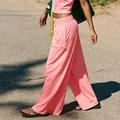 Women's pink athleisure set featuring wide-leg sports pants and a slim yoga tank top - S / Bottoms / Peach