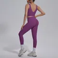 Back view of purple high-waist yoga set featuring a V-neck sports bra and leggings - Magenta Purple