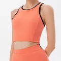 Vibrant orange sports crop top with black trim, perfect for tennis, yoga, and fitness. - S / Tops / With Pads / Orange