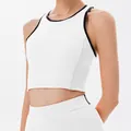 Women's white athletic crop top with black trim for tennis, yoga, and fitness workouts - S / Tops / With Pads / White