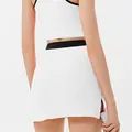 Professional women's white athletic two-piece tennis set with crop top and slit mini skirt - S / Bottoms / With Inner Shorts / White