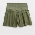 Olive green yoga athletic shorts with crossover high waistband and ruffled hem for women - S / Bottoms / Green