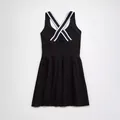Schwarzes Tenniskleid mit farbigen Kreuzträgern am Rücken und einem Faltenrock-Design. - S / Oberteil Und Unterteil / Schwarz