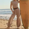 Two-piece solid color women's sleeveless crop top and high-waist joggers set on beach - S / Bottoms / Khaki