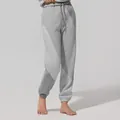 Pantaloni da jogging da donna grigi bicolore per sport e tempo libero di grande stile - Taglia S / Pantaloni e gonne / Grigio