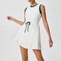 Women's sleeveless white tennis dress with green contrast trim and pleated skirt for sports - S / Top And Bottom / Green