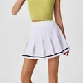 Falda de tenis plisada blanca con rayas negras y top deportivo verde lima. - S / Bottoms / Negro