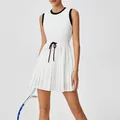 Women's white pleated tennis dress with black contrast trim and drawstring waist - S / Top And Bottom / Black