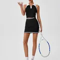 Conjunto deportivo de polo sin mangas negro y falda de tenis a juego - M / Top Y Pantalón / Negro