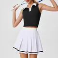 Conjunto deportivo de mujer con polo sin mangas negro y falda de tenis plisada blanca - S / Top Y Pantalón / Negro