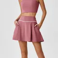 Débardeur de yoga asymétrique rose foncé et jupe de sport plissée à poches - S / Bas / Rouge Corail Pâle