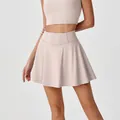 Jupe de sport évasée rose clair à taille haute pour le yoga et les entraînements - S / Bas / Abricot Lacté