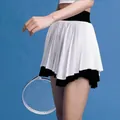 Women's pleated tennis skirt with a stylish two-layer black and white contrast design - S / Bottoms / Black