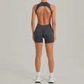 Back view of a sleek dark grey backless one-piece yoga romper for women's fitness - S / Top And Bottom / Charcoal Gray