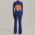 Back view of a premium navy blue backless long-sleeve flared yoga jumpsuit for fitness - S / Top And Bottom / Navy Blue