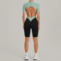 Backless mock neck color-block fitness jumpsuit in mint green and black for workout - Bean Green